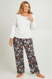 Model Fiona wearing the Winter Solstice Mercerised Cotton PJ Pants in colour Solstice (Black), from the front, showing the whole outfit
