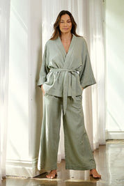 Model Amanda wearing the Cotton Wide Leg Lounge Pant in colour Sage (Green), from the front, showing the whole outfit