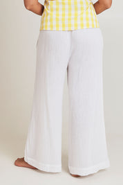 Model Terri-Leigh wearing the Cotton Wide Leg Lounge Pant in colour White (White), from the front, cropped image