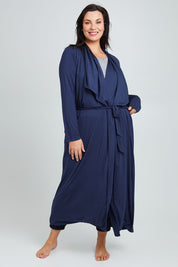 Model Poppy wearing the Jersey Wrap Maxi Cardi in colour Denimblue (Blue), from the front, showing the whole outfit