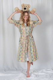 Model Olivia wearing the Summer Cotton Robe With Tie in colour Cottage (Pink), from the front, showing the whole outfit