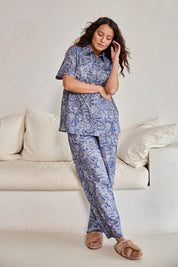 Model Tahneei wearing size 10 of the Cotton Short Sleeve Pyjama Set – Navypais in colour Navypais, from the front