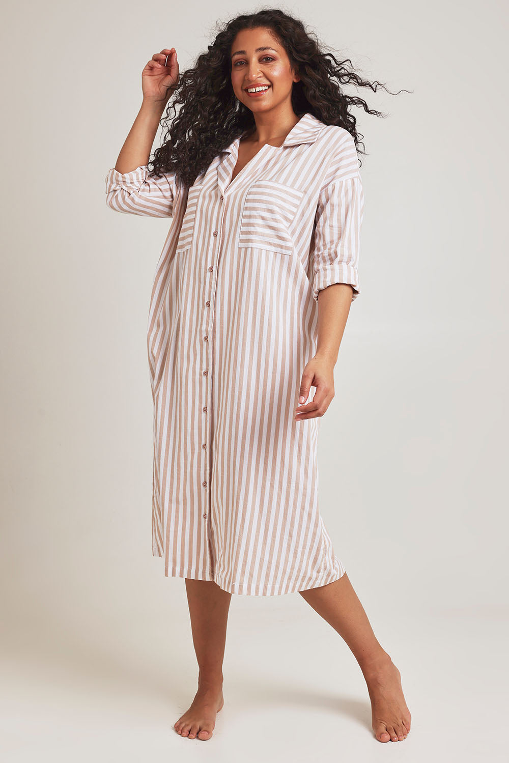 Model Terri-Leigh wearing the Oversized Cotton Sleep Shirt in colour Sandstripe, from the front, showing the whole outfit