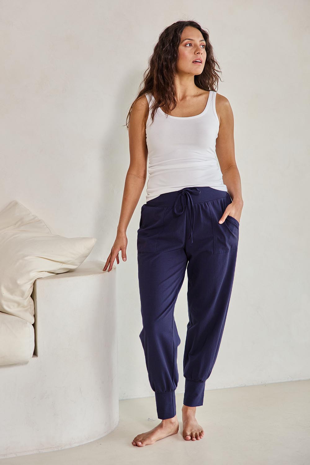 Model Tahneei wearing size 10 of the Cotton Jersey Pull On Jogger – Ink in colour Ink, from the front