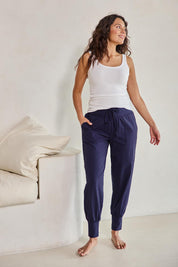 Model Tahneei wearing size 10 of the Cotton Jersey Pull On Jogger – Ink in colour Ink, from the front