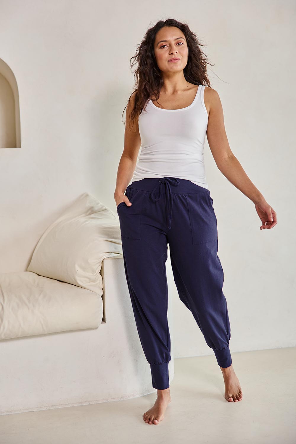 Model Tahneei wearing size 10 of the Cotton Jersey Pull On Jogger – Ink in colour Ink, from the front