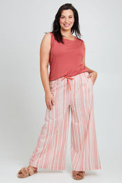 Model Poppy wearing the Cotton Pull On Lounge Pants in colour Pinkstripe (Pink), from the front, showing the whole outfit