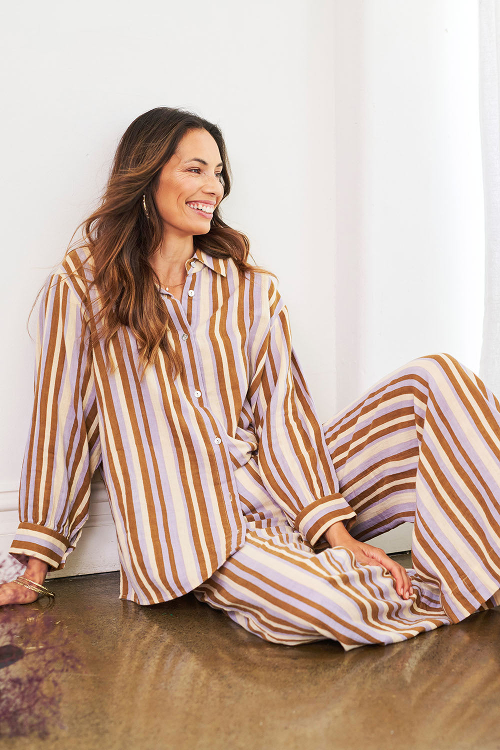 Model Amanda wearing the Striped Cotton Lounge Shirt in colour Lilacstrip, from the front, showing the whole outfit