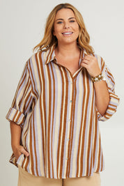 Model Fiona wearing the Striped Cotton Lounge Shirt in colour Lilacstrip, from the front, cropped image