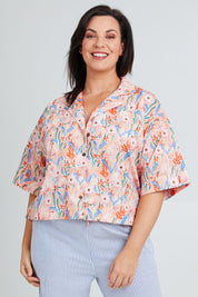 Model Poppy wearing the Golden Days Mercerised Cotton PJ Shirt in colour Golden, from the front, cropped image