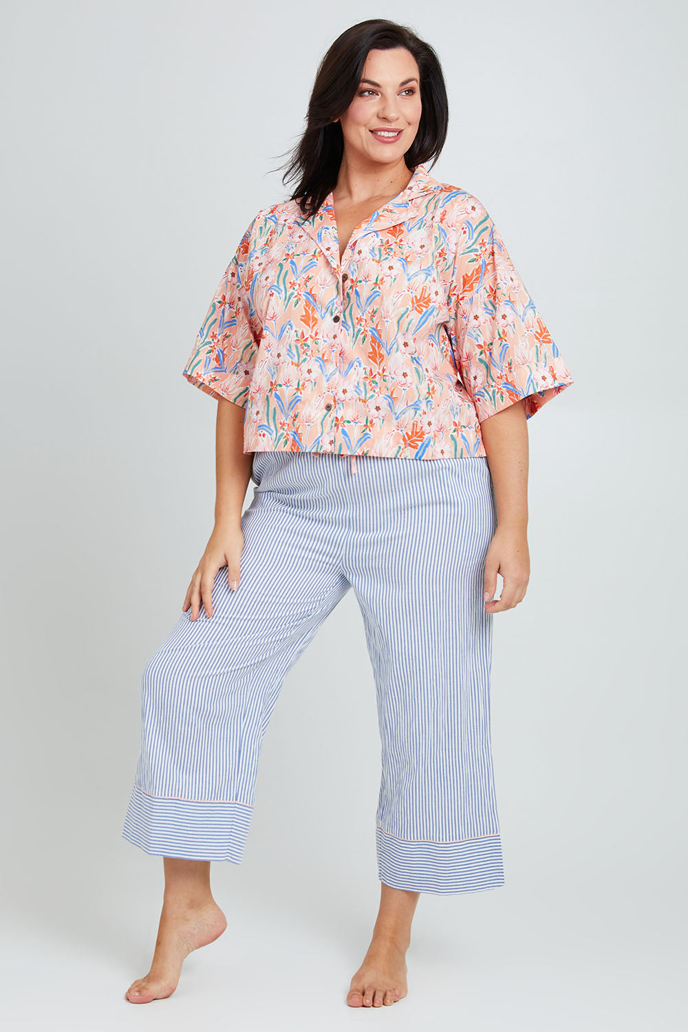 Model Poppy wearing the Golden Days Mercerised Cotton PJ Shirt in colour Golden, from the front, showing the whole outfit