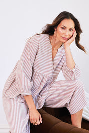 Model Amanda wearing the Cotton Stripe Lounge Top in colour Camel, from the front, cropped image