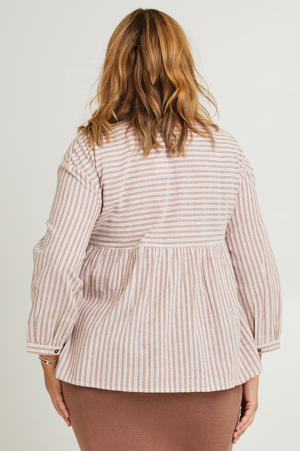 Model Fiona wearing the Cotton Stripe Lounge Top in colour Camel, from the back