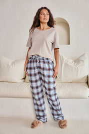 Model Tahneei wearing size 10 of the Cotton Flannel Winter Pyjama Pants – Navycheck in colour Navycheck, from the front