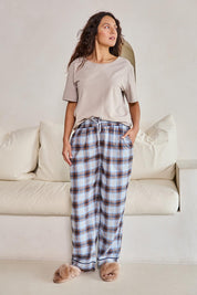 Model Tahneei wearing size 10 of the Cotton Flannel Winter Pyjama Pants – Navycheck in colour Navycheck, from the front