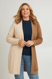 Model Fiona wearing the Colourblocked Longline Cardigan in colour Pancake, from the front, cropped image