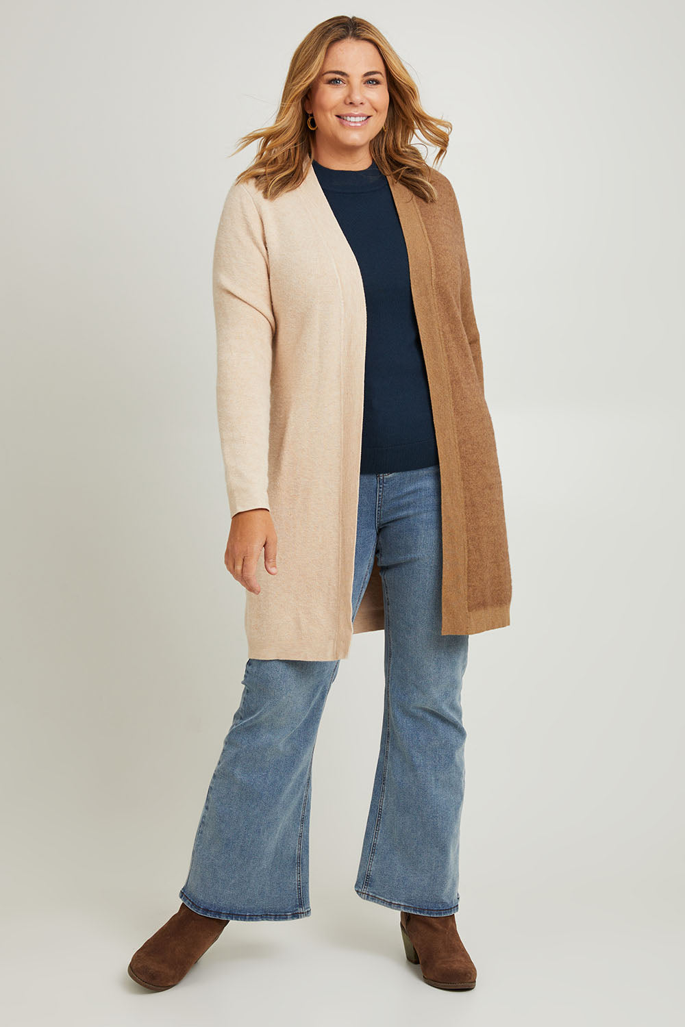 Model Fiona wearing the Colourblocked Longline Cardigan in colour Pancake, from the front, showing the whole outfit