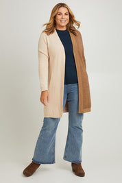 Model Fiona wearing the Colourblocked Longline Cardigan in colour Pancake, from the front, showing the whole outfit