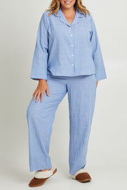 Model Fiona wearing the Cotton Linen Mismatched Pyjama Set in colour Denimstrip (Blue), from the front, cropped image