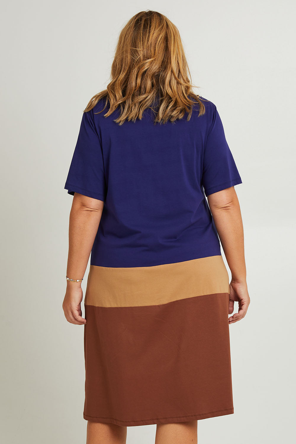 Model Fiona wearing the Cotton Jersey Stripe Nightie in colour Night (Blue), from the back