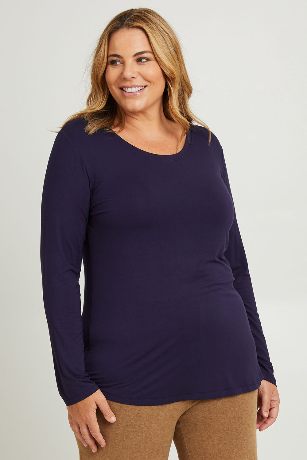 Model Fiona wearing the Classic Fit Long Sleeve Modal Tee in colour Midnight (Blue), from the front, cropped image