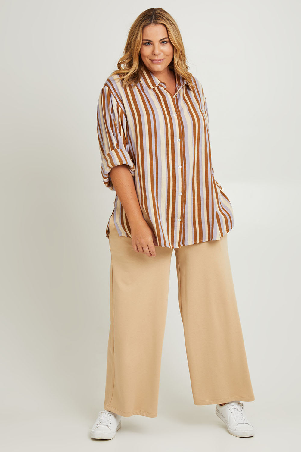 Model Fiona wearing the Cotton Terry Wide Leg Track Pants in colour Porridge, from the front, showing the whole outfit