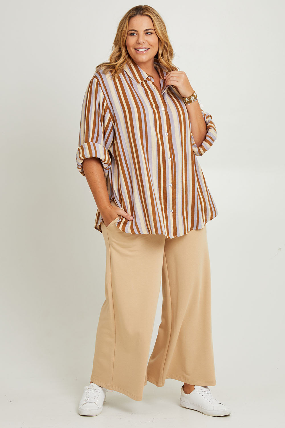 Model Fiona wearing the Cotton Terry Wide Leg Track Pants in colour Porridge, from the front, showing the whole outfit