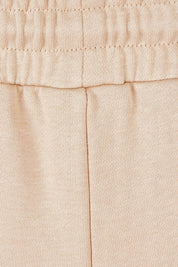 Product shot of the Cotton Terry Wide Leg Track Pants in colour Porridge, detail