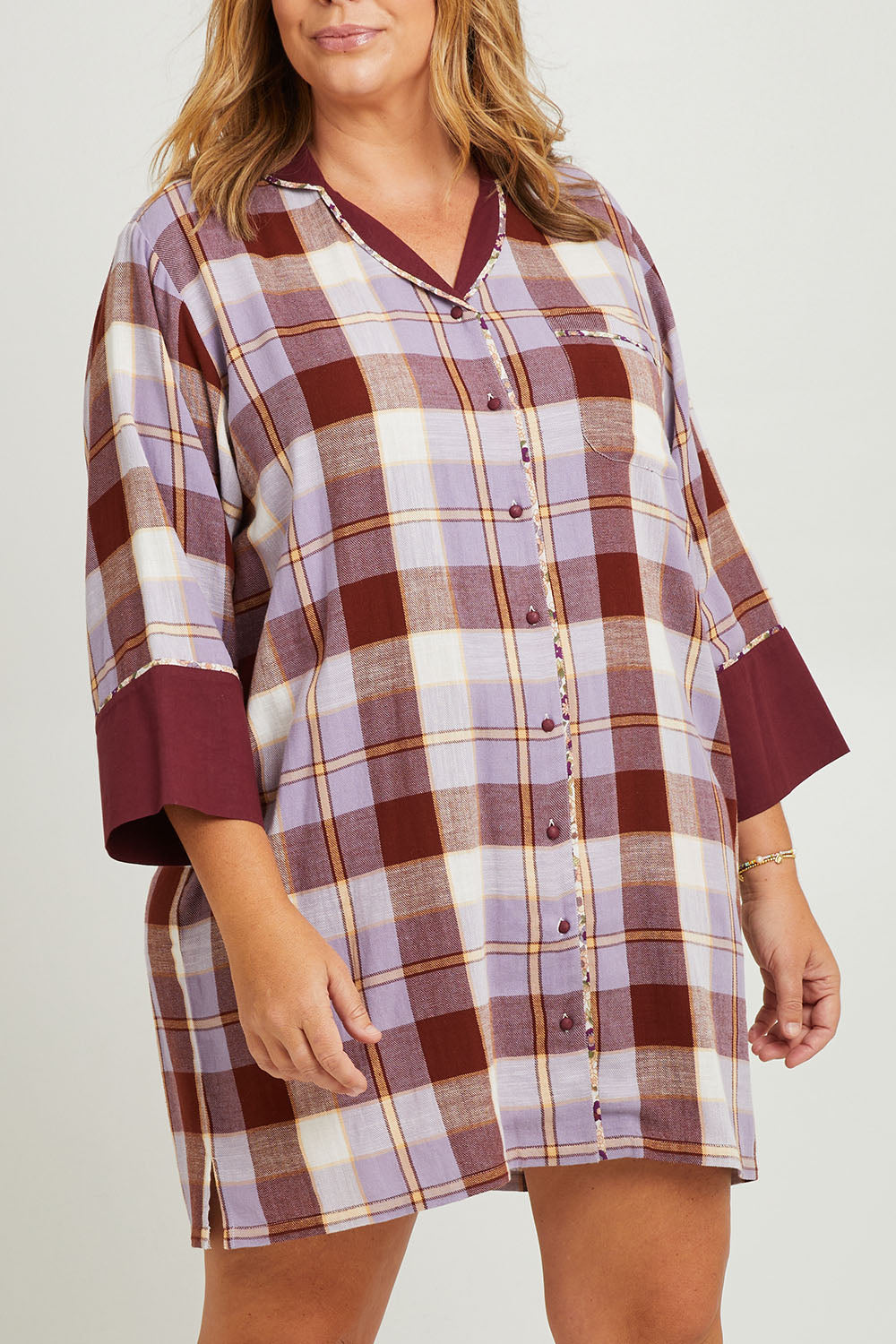 Model Fiona wearing the Cotton Flannel Winter Nightie in colour Lilaccheck (Purple), from the front, cropped image