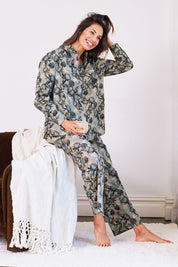 Model Amanda wearing the Cotton Long Sleeve Pyjama Set in colour Protea (Green), from the front, showing the whole outfit