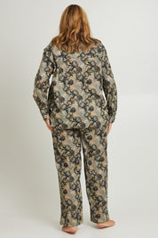 Model Fiona wearing the Cotton Long Sleeve Pyjama Set in colour Protea (Green), from the back