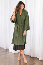 Model Amanda wearing the Cotton Waffle Dressing Robe in colour Norigreen (Green), from the front, showing the whole outfit