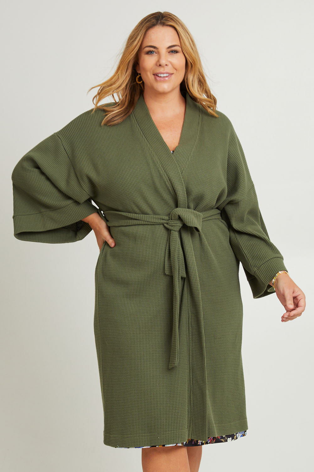Model Fiona wearing the Cotton Waffle Dressing Robe in colour Norigreen (Green), from the front, showing the whole outfit