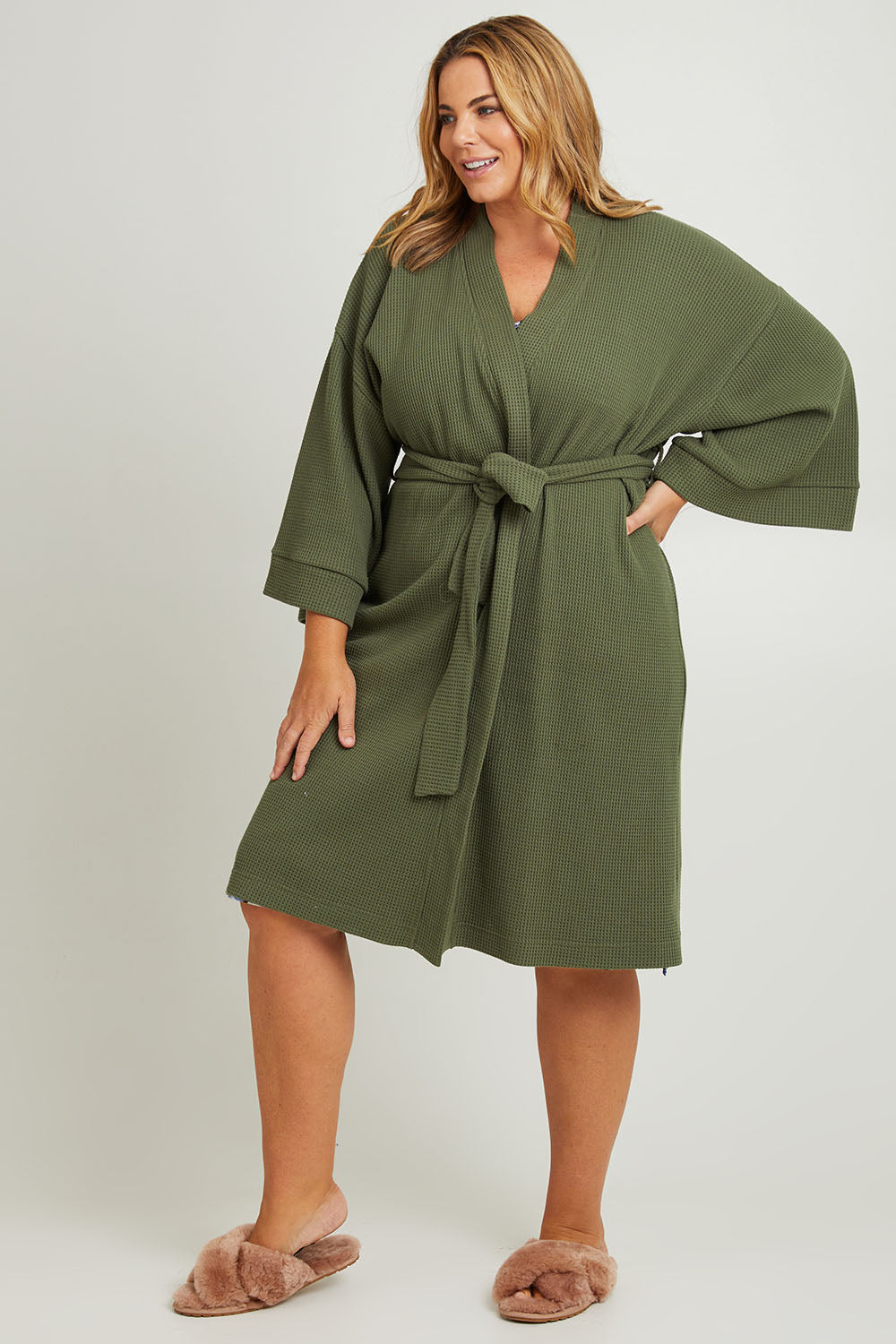 Model Fiona wearing the Cotton Waffle Dressing Robe in colour Norigreen (Green), from the front, showing the whole outfit