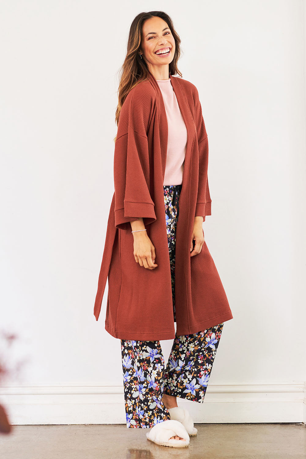 Model Amanda wearing the Cotton Waffle Dressing Robe in colour Rhubarb (Red), from the front, showing the whole outfit