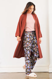 Model Amanda wearing the Cotton Waffle Dressing Robe in colour Rhubarb (Red), from the front, showing the whole outfit