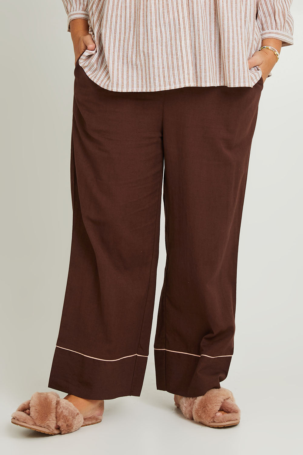 Model Fiona wearing the Cotton Full Length Pyjama Pants in colour Chocolate, from the front, cropped image
