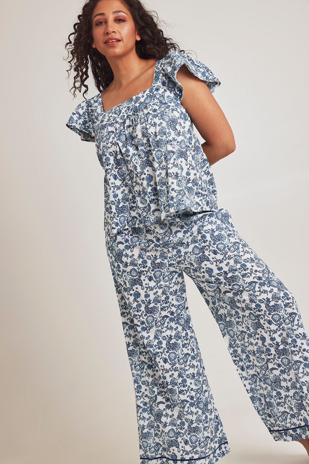 Model Terri-Leigh wearing the Cotton Frill Cami Sleep Set in colour Paisley (Blue), from the front, showing the whole outfit