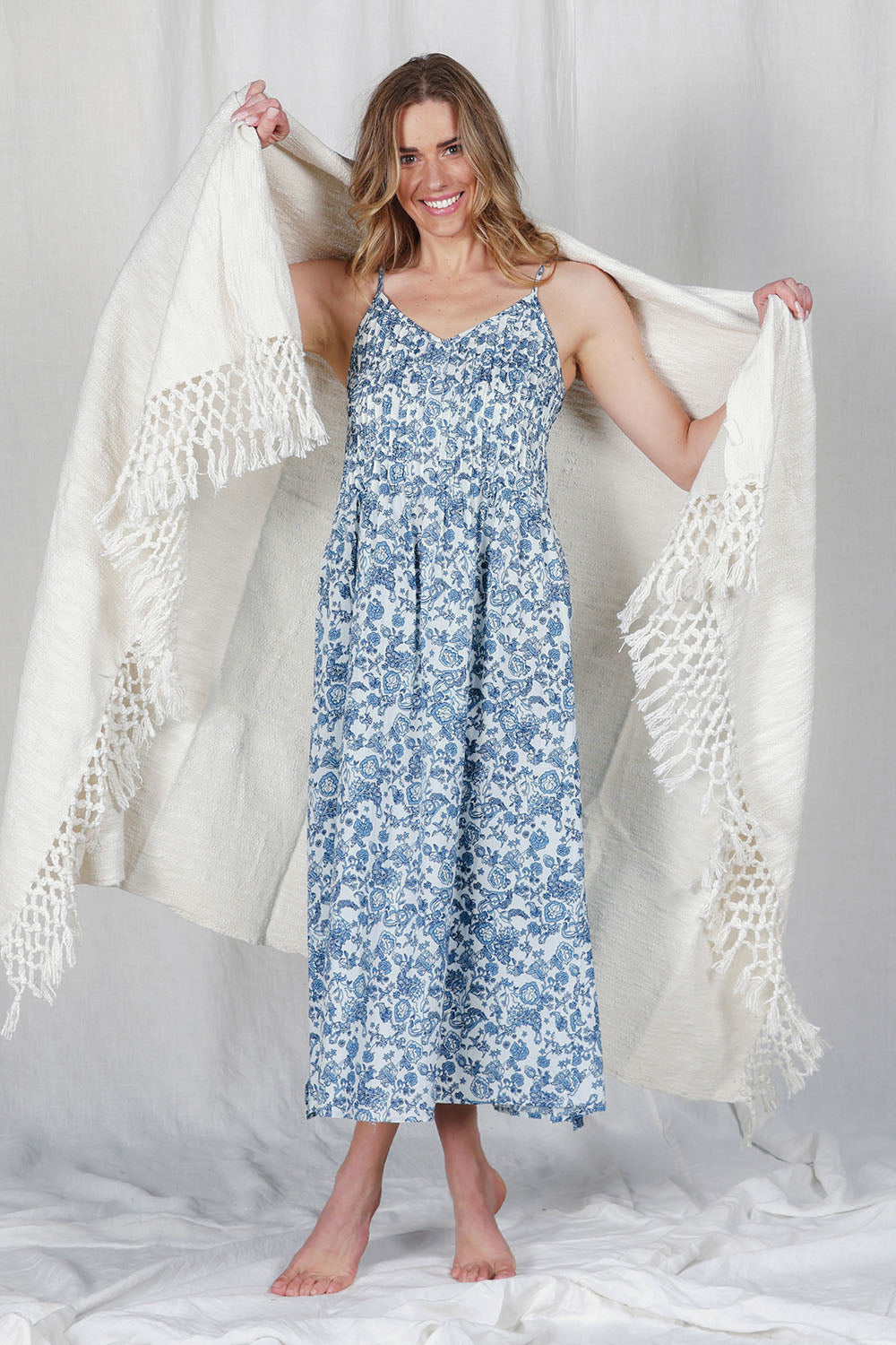 Model Olivia wearing the Cotton Pintucked Slip in colour Paisley (Blue), from the front, showing the whole outfit