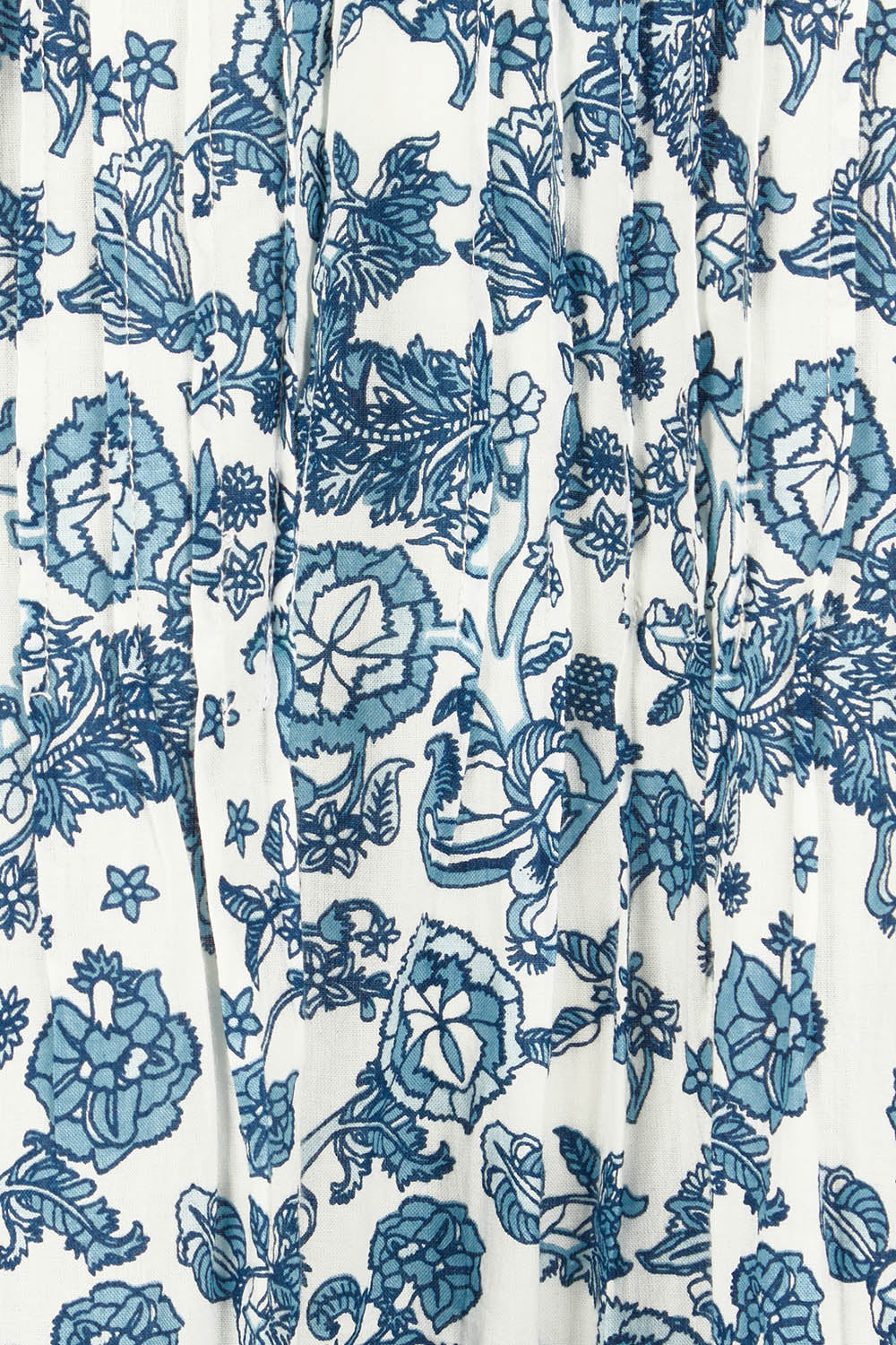 Product shot of the Cotton Pintucked Slip in colour Paisley (Blue), detail