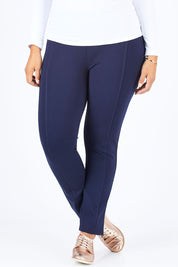 Model Palatina wearing size 14 of the Ponti Skinny Leg Pull On Pant in colour Navy (Blue), from the front, cropped image