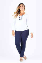 Model Palatina wearing size 14 of the Ponti Skinny Leg Pull On Pant in colour Navy (Blue), from the front, showing the whole outfit