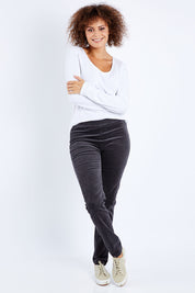 Model Lala wearing size 10 of the Skinny Leg Cord Pull On Pant in colour Charcoal (Grey), from the front, showing the whole outfit