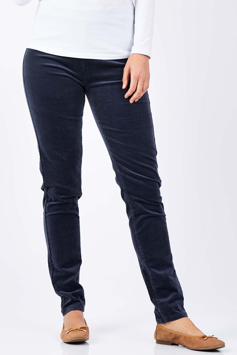 Model Anna wearing size 10 of the Skinny Leg Cord Pull On Pant in colour Graphite (Black), from the front, cropped image