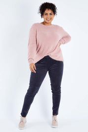 Model Sasha-Lee wearing size 16 of the Skinny Leg Cord Pull On Pant in colour Graphite (Black), from the front, showing the whole outfit