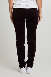 Model Katie wearing size 10 of the Skinny Leg Cord Pull On Pant in colour Mulberry (Purple), from the back