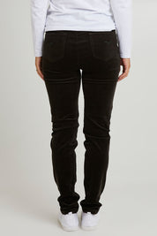 Model Katie wearing size 10 of the Skinny Leg Cord Pull On Pant in colour Olive (Green), from the back