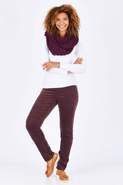 Model Summer wearing size 10 of the Skinny Leg Cord Pull On Pant in colour Vino (Purple), from the front, showing the whole outfit