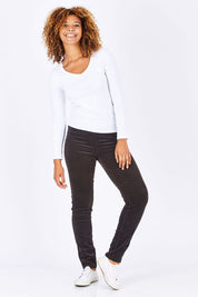Model Summer wearing size 10 of the Skinny Leg Cord Pull On Pant in colour Walnut, from the front, showing the whole outfit