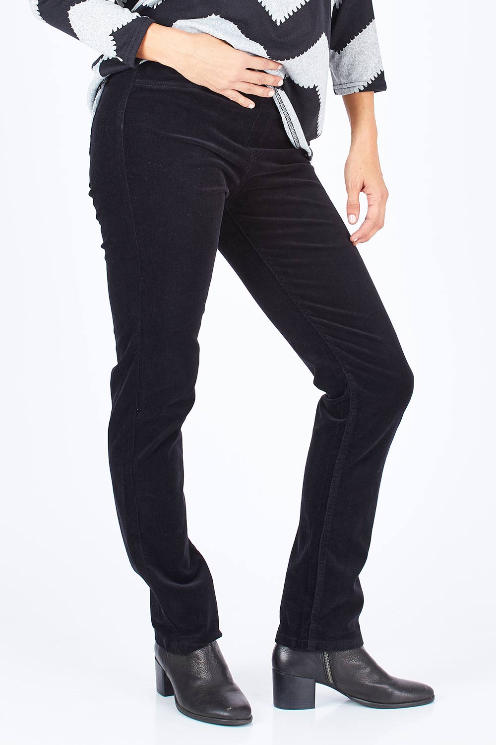 Model Gemma wearing size 10 of the Pin Cord Slim Pant in colour Black (Black), from the front, cropped image